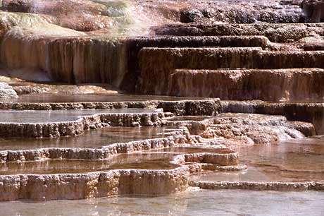 A series of ledges spill down the side of a hill