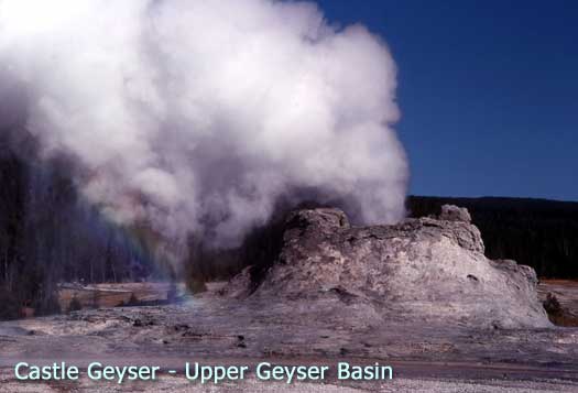 Steam escapes the cone of Castle geyser