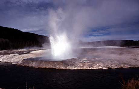 Cliff Geyser erupts on the banks of Iron Spring Creek