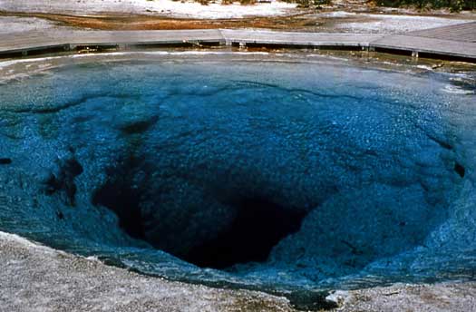 Clear blue water is a feature of Morning Glory Pool
