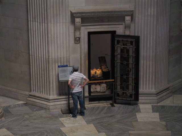 Visitor  near a vault at Federal Hall National Memorial