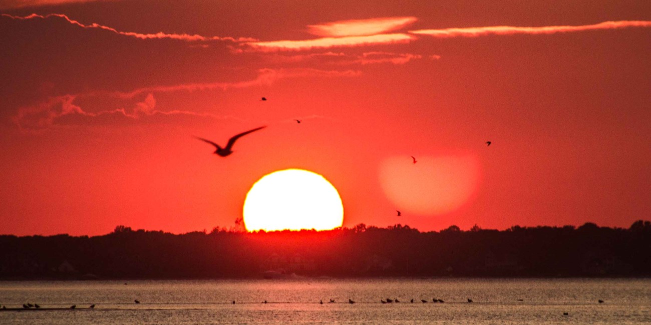 A fiery sunset over Fire Island