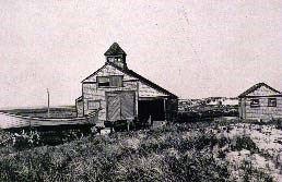 Postcard view of life saving station.