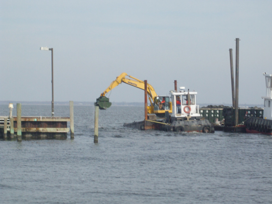 Dredging equipment in marina channel.