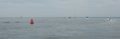 Ferry and other vessels by red buoy in Watch Hill channel.
