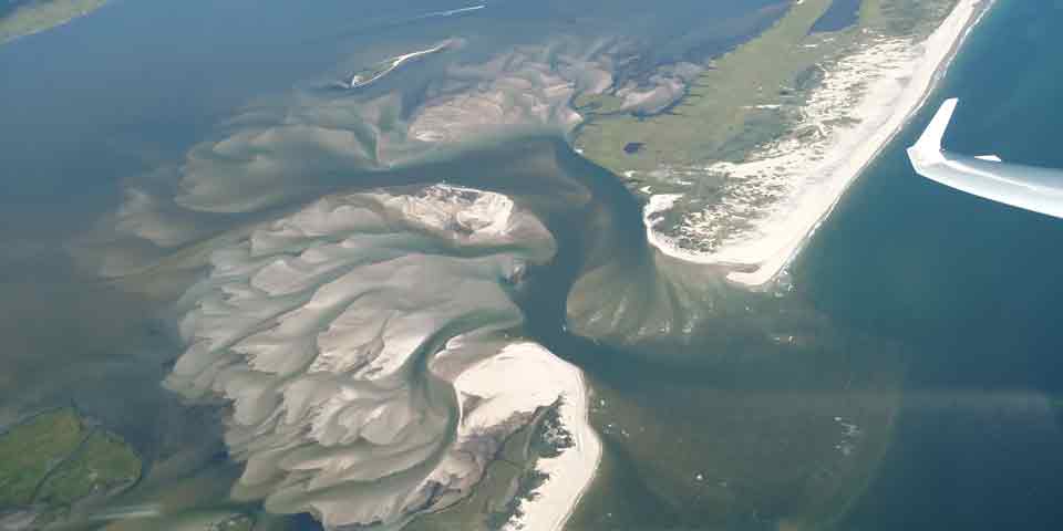 Aerial image of opening in barrier island.