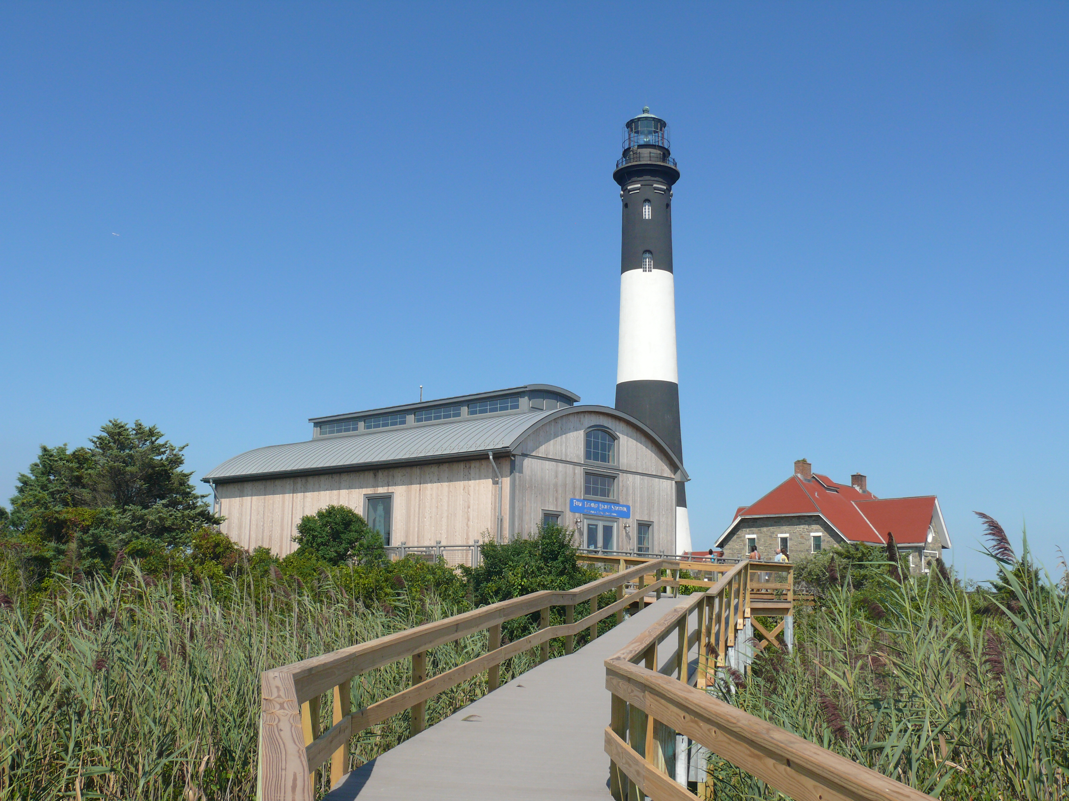 View of Fire Island Lighthouse Fresnel Lens Building from boardwalk