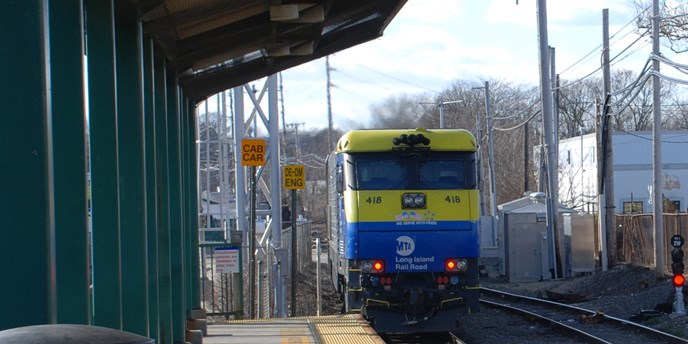 Long Island Railroad Train pulls into station