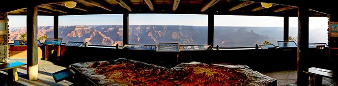 View of the Grand Canyon from inside the Yavapal Geology Museum, with exhbits in foreground. View of the Grand Canyon from inside the Yavapal Geology Museum, with exhbits in foreground.
