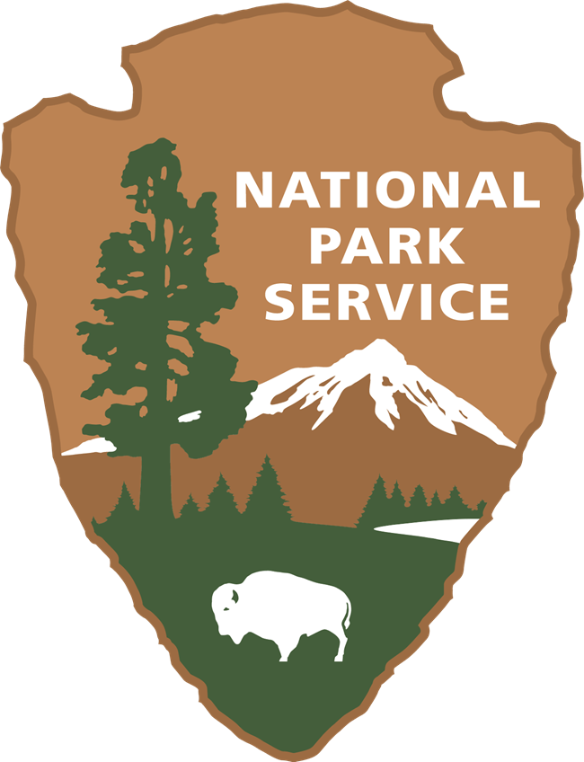 The brown and green NPS arrowhead logo on a white background.