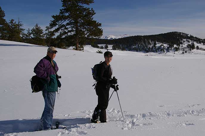 visitor snowshoeing for health in the park
visitor snowshoeing for health in the park
