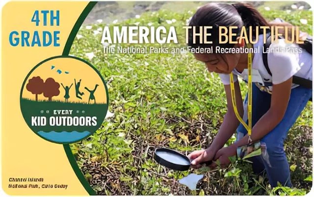 2021-2022 Every Kid Outdoors 4th Grade Pass with image of girl looking at leaves with hand lens