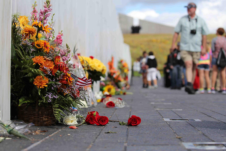 Flowers left in tribute lay at the Wall of Names along the flight path of Flight 93.