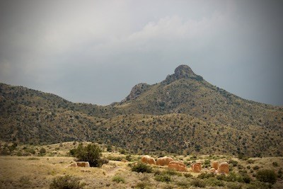 Overcast skies over adobe wall ruins