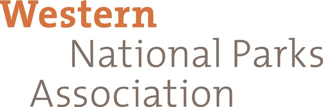 words Western National Parks Association.  Western is in orange and bold, the rest of the text is gray