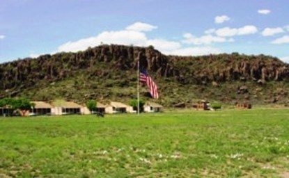 Garrison flag flying over the parade ground at Fort Davis.