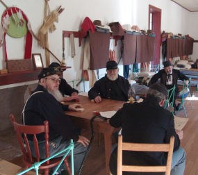 Reenactors in the enlisted men's barracks.