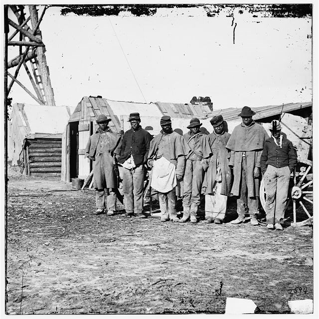 Nineteenth century workers in Union camp