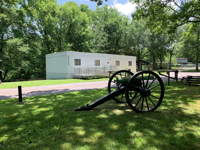 Temporary visitor center with cannon carriage
