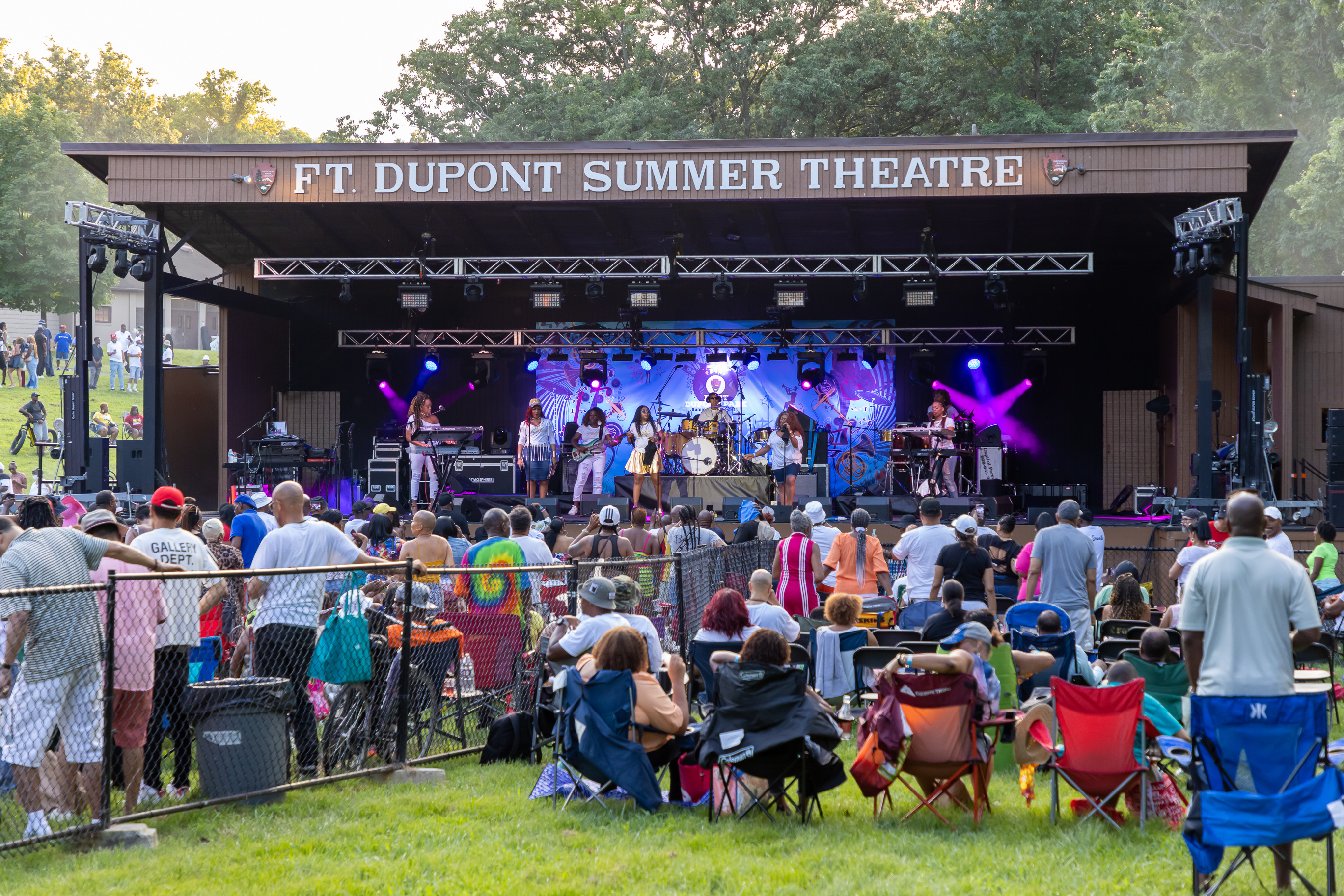 A group of musicians and vocalists perform at the Fort Dupont Park Summer Event Series in 2022