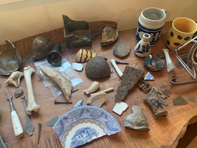 pottery, ceramics, glass and bone artifacts
