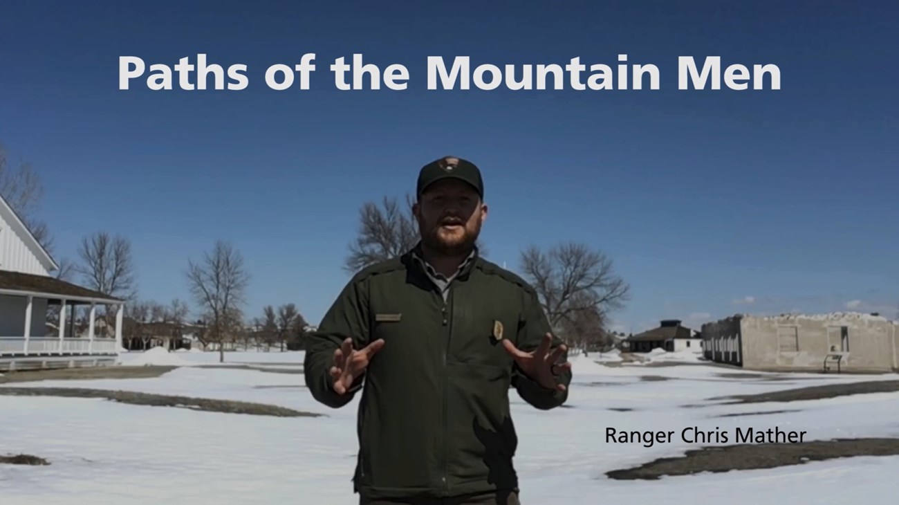 Ranger Chris Mather speaking at Fort Laramie on a snowy day.