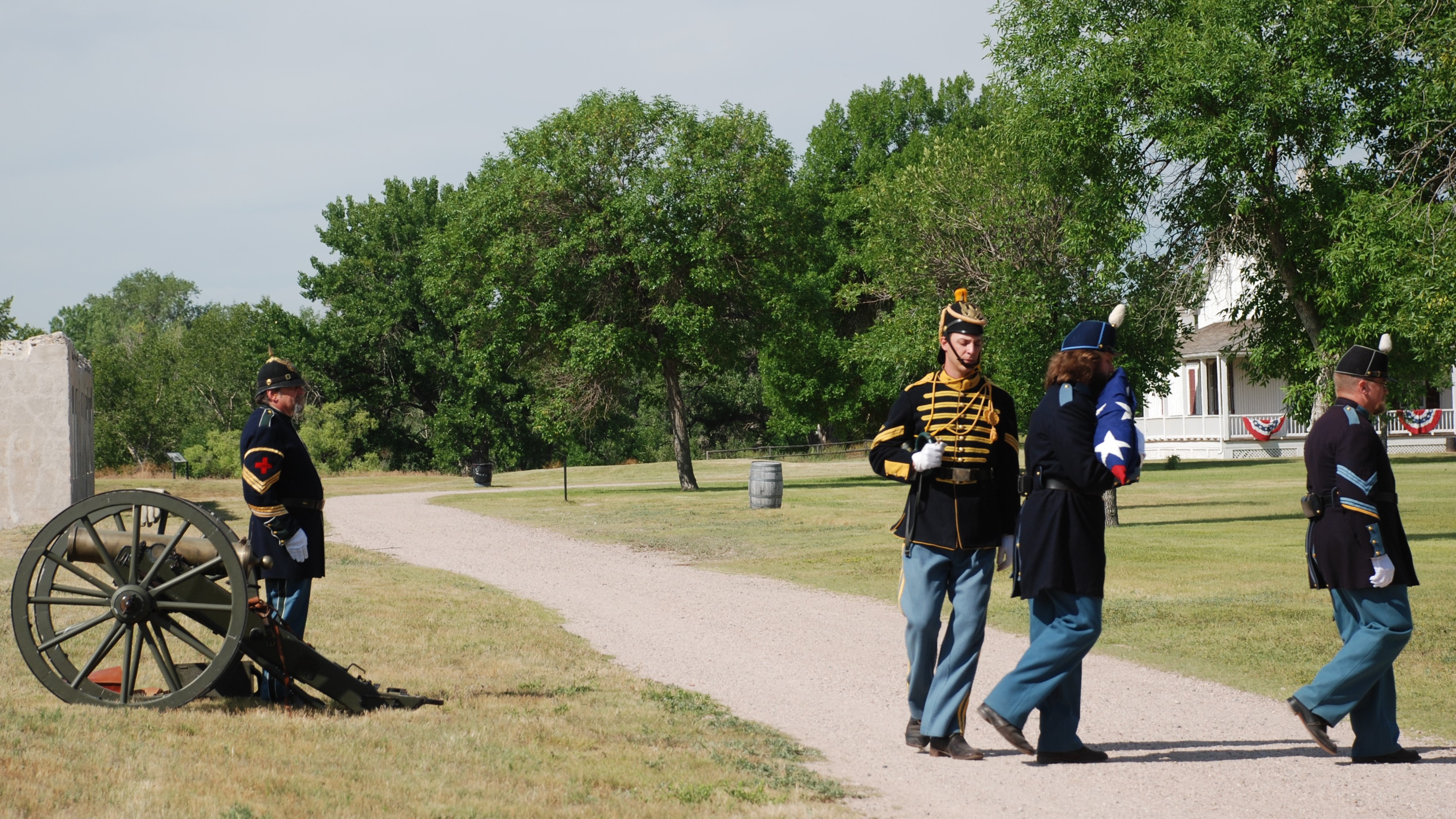 Fort Laramie Fourth of July. NPS Photo Park staff in living history clothing prepare to raise the flag on the 4th of July.