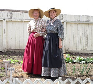Photo of two women in 19th century clothing. Photo of two women in 19th century clothing.