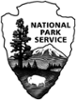 Black and white NPS arrowhead logo.