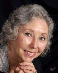 Color photo of Charlotte Hinger. Color photo of Charlotte Hinger.