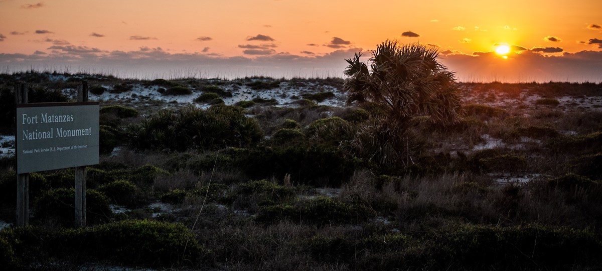 Sunrise over the ocean dunes.