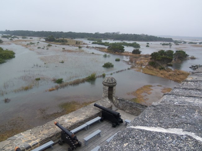 View looking south of the Matanzas River during high tide flooding near fort.