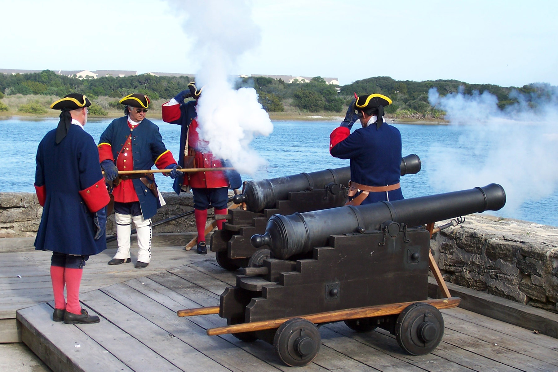 Four Spanish Soldiers fire cannon