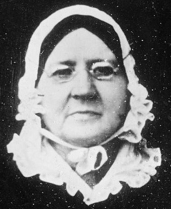 A black and white photograph of Mary Pickersgill wearing a bonnet.