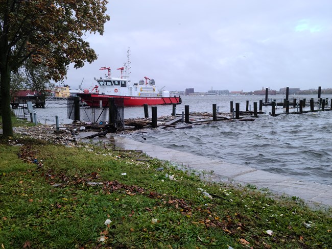 Pier at Fort McHenry is destroyed by storm surge.