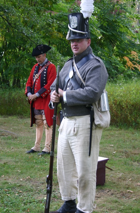 Re-enactors dressed as soldiers from French and Indian War and War of 1812.