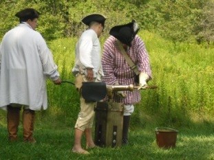 Loading the Swivel Gun.