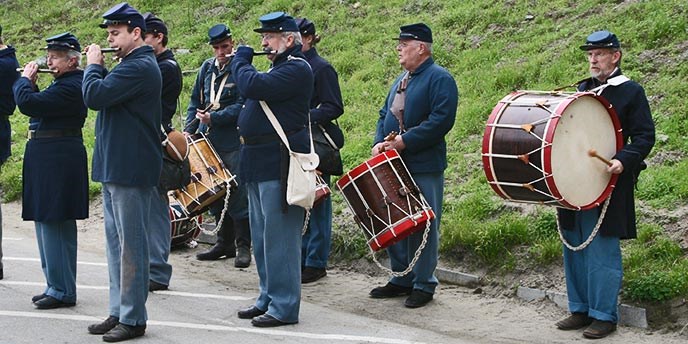 Volunteer reenactors in fife and drum corps Volunteer reenactors in fife and drum corps