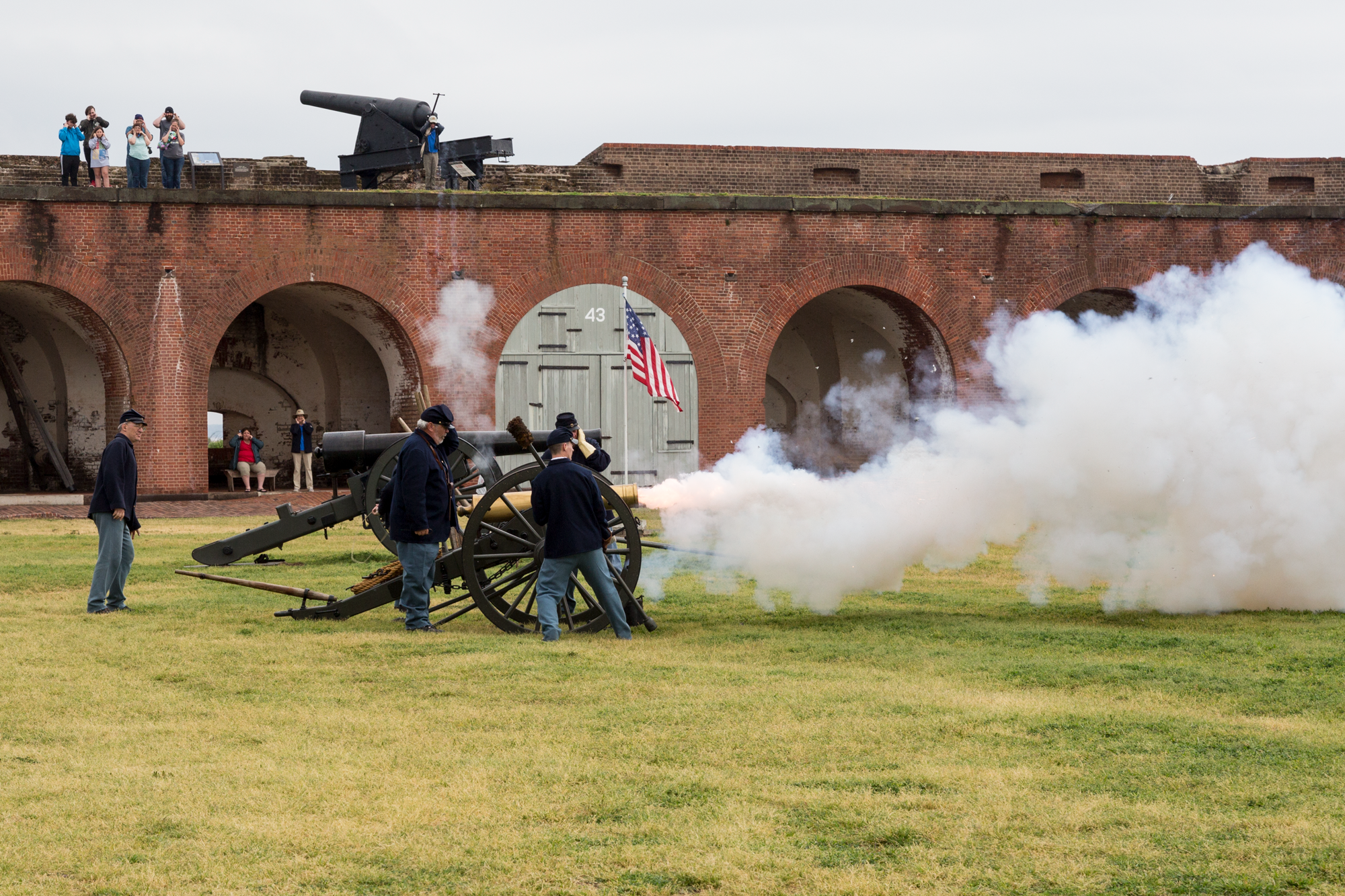Cannon firing on the parade ground of Fort Pulaski Union soldiers in blue fire a cannon the parade of Fort Pulaski