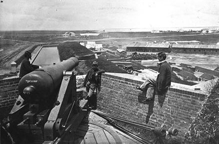 Soldiers atop Fort Pulaski's southwest baation overlooking demilune