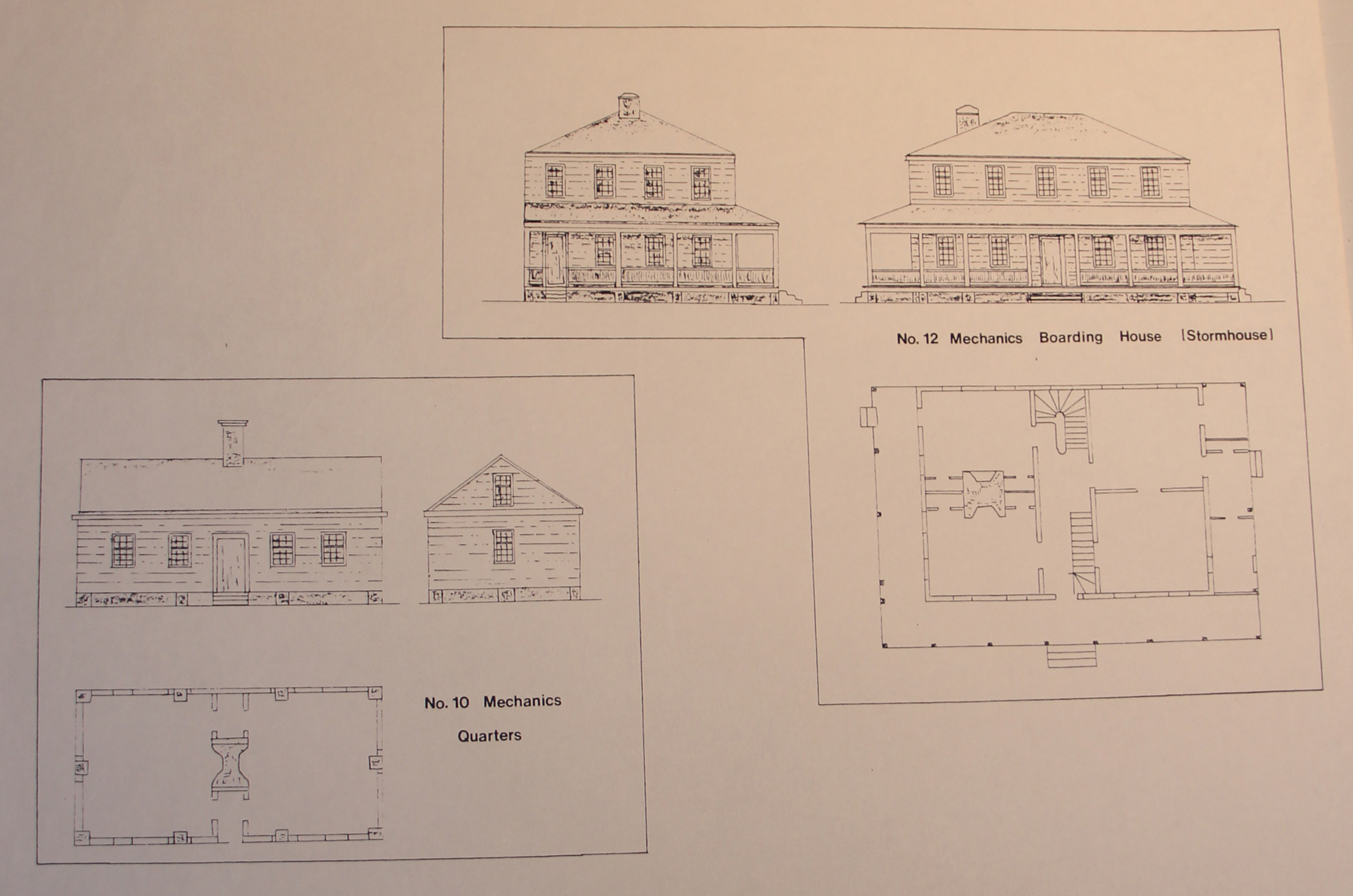 Two-story wooden building with wrap-around porch and a smaller, one-story wooden building. Each has one chimney.
