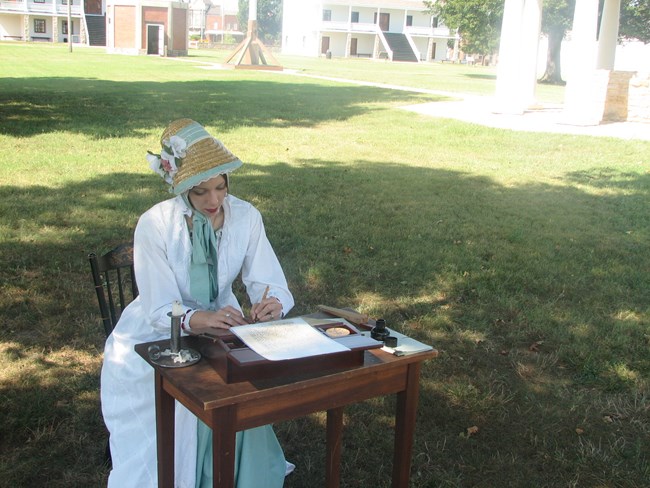 Officer's wife writing letters Officer's wife writing letters