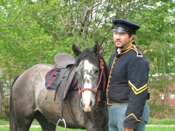 Dragoon with Horse near Stables