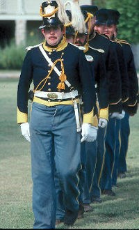 Dragoons in dress uniform march in file