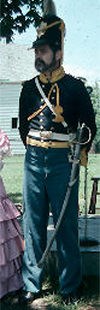Dragoon soldier in 1840s dress uniform with saber
