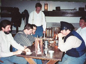 Soldiers playing checkers in the aquad room.