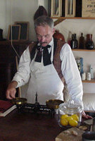 Volunteer Tim Field portrays post sutler at Fort Scott Volunteer Tim Field portrays post sutler at Fort Scott