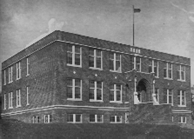 two story building with several windows