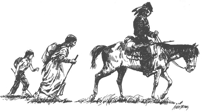 A man on horse with a woman and child following