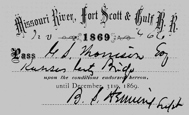 Black and white 1869 railroad pass showing person's name. Words read "Missouri River, Fort Scott & Gulf R. R." across the top.